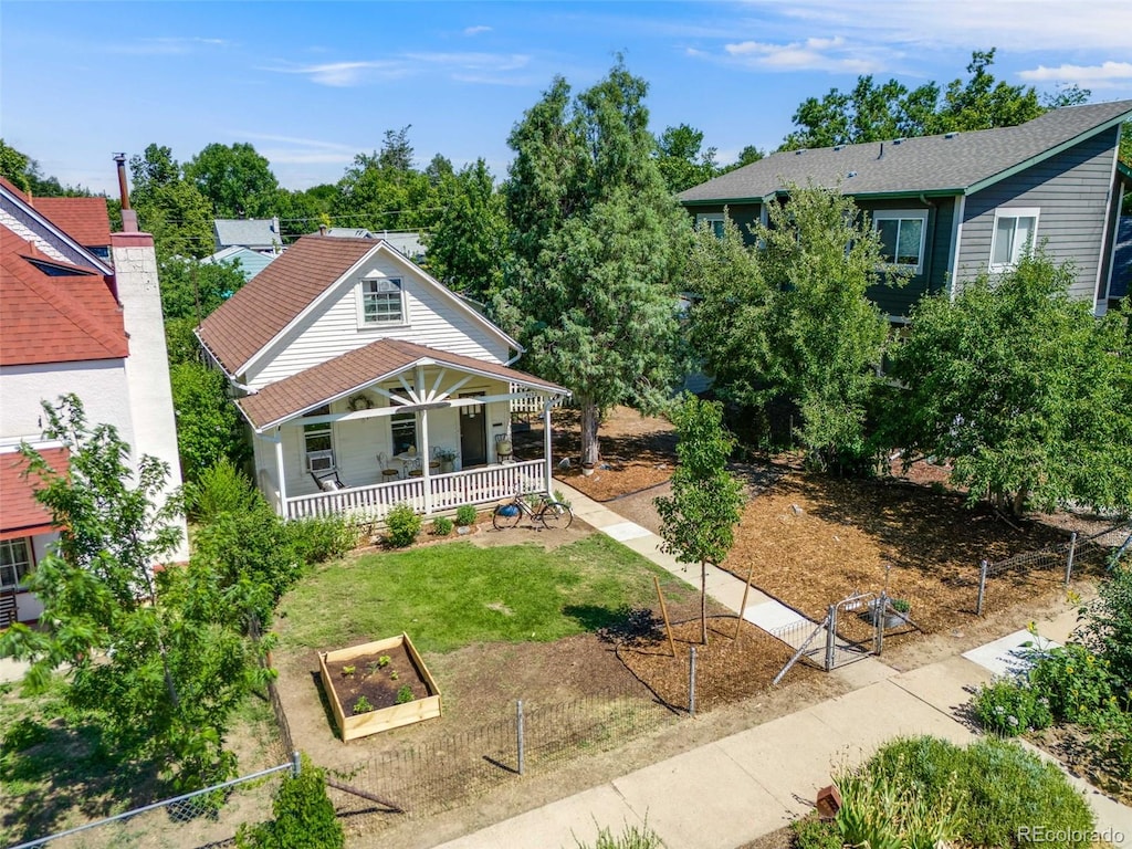 view of front of home featuring a front lawn and a porch