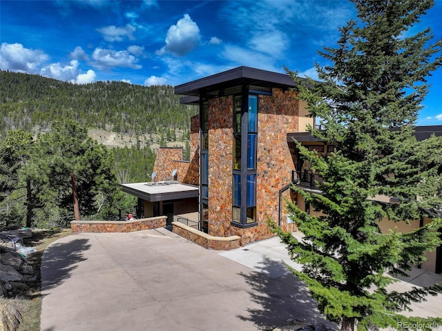 180 Outpost Ln, Evergreen, CO 80439 - exterior space with a view of trees and a mountain view