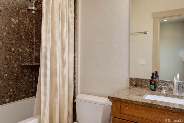 180 Outpost Ln, Evergreen, CO 80439 - bathroom with toilet, vanity, and shower / bath combo