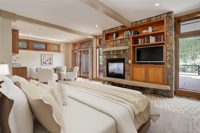 180 Outpost Ln, Evergreen, CO 80439 - living room featuring beam ceiling, a stone fireplace, and recessed lighting