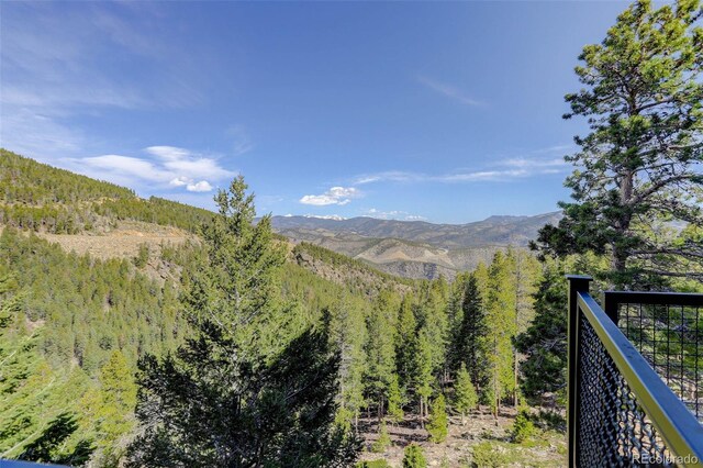 180 Outpost Ln, Evergreen, CO 80439 - view of mountain backdrop featuring a forest
