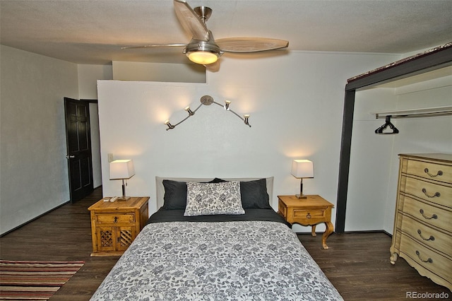 10 Baca Meadows Townhome Rd, Crestone, CO 81131 - bedroom with dark wood-style floors and ceiling fan