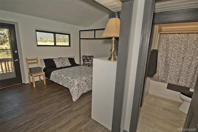 10 Baca Meadows Townhome Rd, Crestone, CO 81131 - bedroom featuring lofted ceiling and wood finished floors