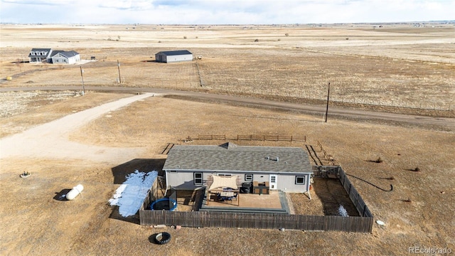aerial view of sparsely populated area with a desert landscape