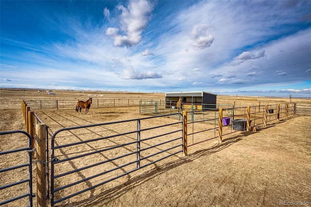 6201 S Vanderhoof St, Bennett, CO 80102 - view of yard featuring a view of rural / pastoral area, an exterior structure, and an outbuilding