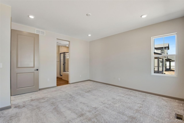 24593 E 34th Ave, Aurora, CO 80019 - unfurnished room featuring carpet, baseboards, and recessed lighting