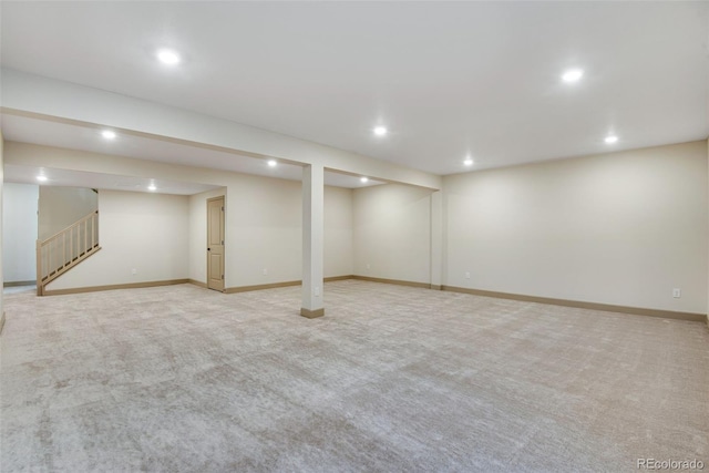 24593 E 34th Ave, Aurora, CO 80019 - finished below grade area with recessed lighting, light colored carpet, stairs, and baseboards