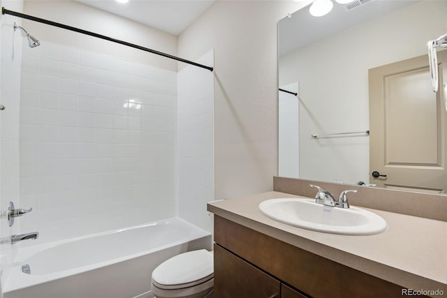 24593 E 34th Ave, Aurora, CO 80019 - bathroom featuring bathing tub / shower combination, toilet, and vanity