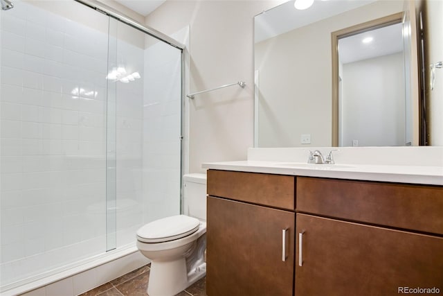 24593 E 34th Ave, Aurora, CO 80019 - full bath featuring toilet, a shower stall, and vanity