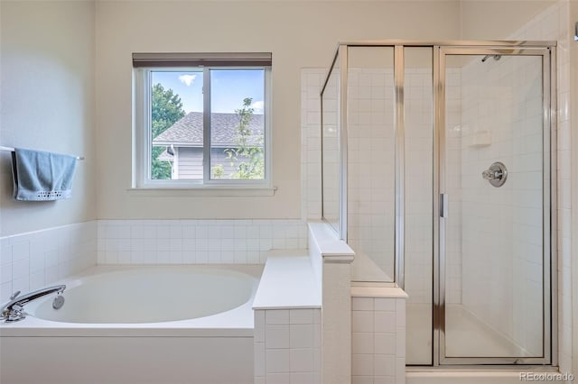7831 S Addison Way, Aurora, CO 80016 - full bath featuring a garden tub and a stall shower