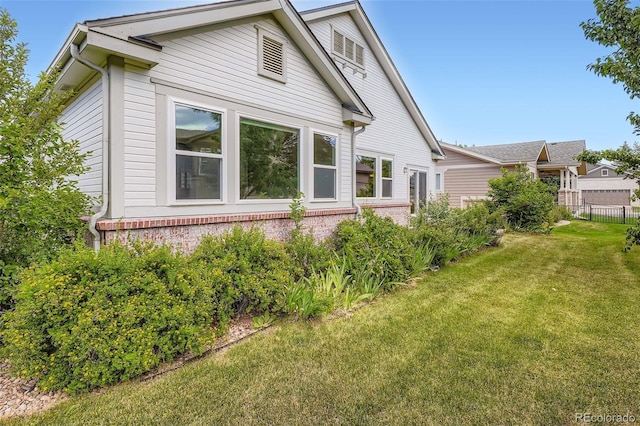 7831 S Addison Way, Aurora, CO 80016 - view of home's exterior with brick siding