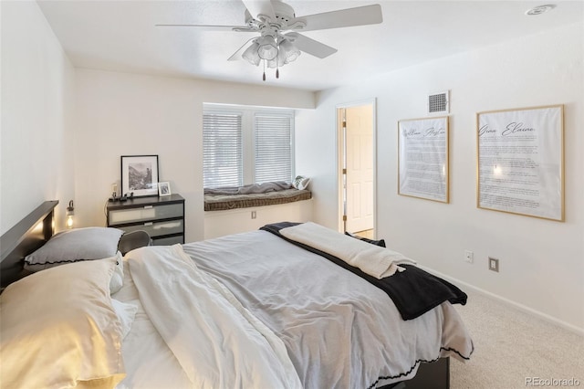 bedroom with ceiling fan and carpet flooring