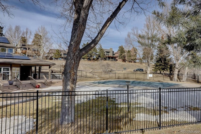 pool with fence private yard and a patio