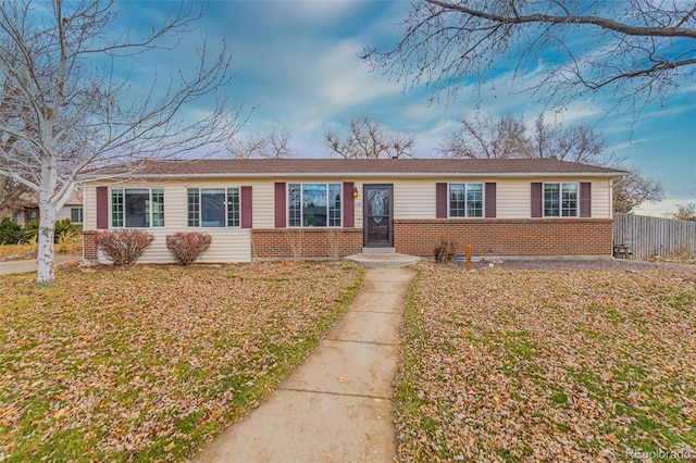 single story home with a front yard