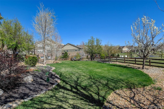 view of yard with fence