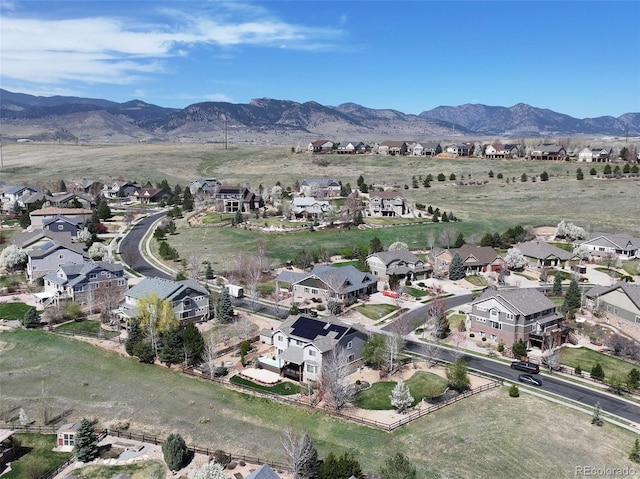 drone / aerial view with a mountain view and a residential view