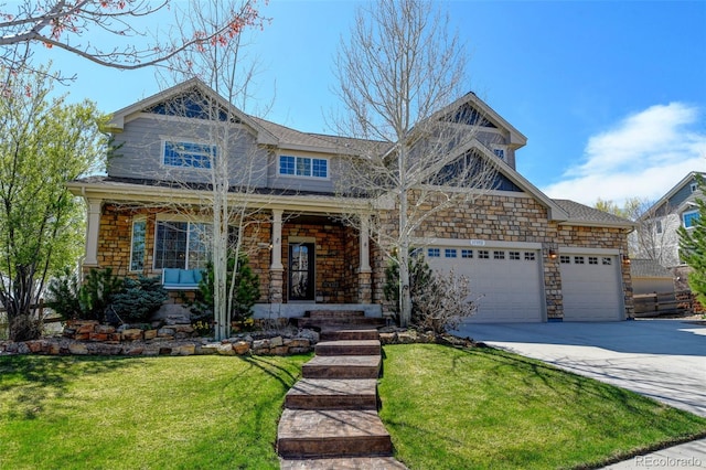 craftsman-style house featuring concrete driveway, stone siding, a front yard, a porch, and a garage