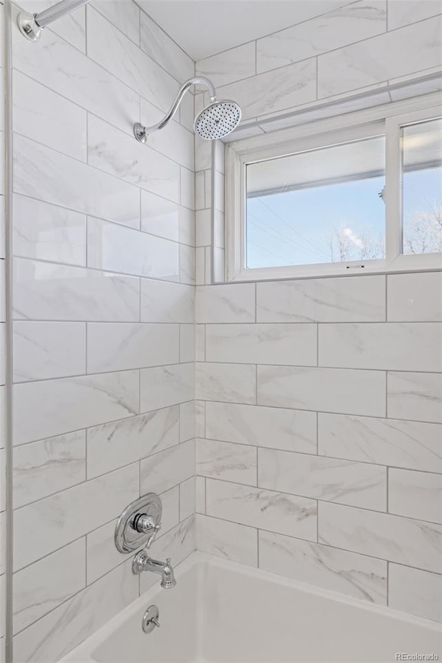 bathroom with shower / bath combination