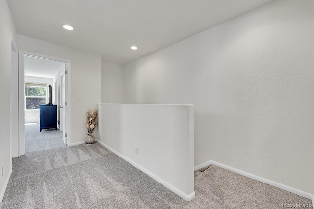 18947 E 57th Pl, Denver, CO 80249 - hall with carpet, an upstairs landing, and recessed lighting