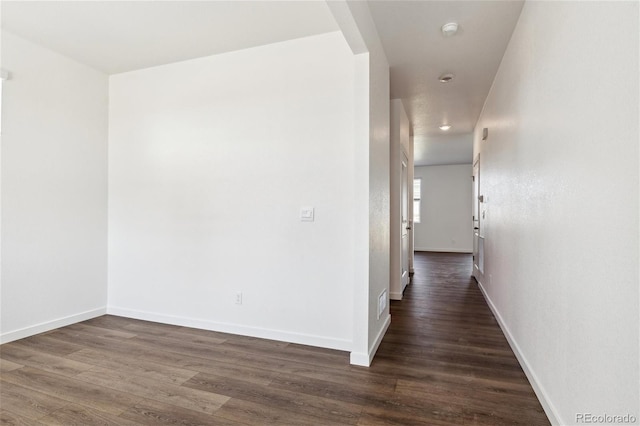 27424 E Byers Ave, Aurora, CO 80018 - corridor featuring baseboards and dark wood-style flooring