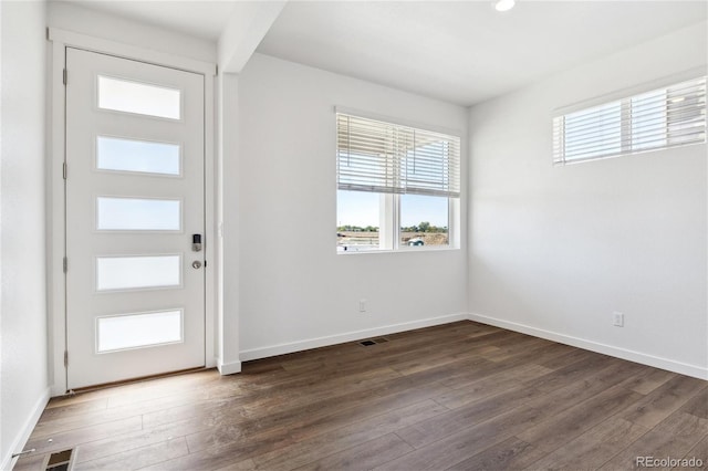 27424 E Byers Ave, Aurora, CO 80018 - foyer entrance with plenty of natural light and dark wood finished floors