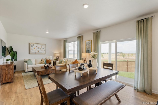 27424 E Byers Ave, Aurora, CO 80018 - dining area featuring light wood-style floors and recessed lighting