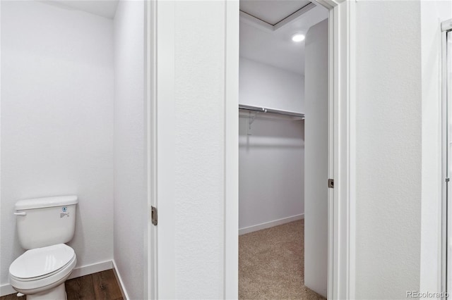 27424 E Byers Ave, Aurora, CO 80018 - bathroom featuring toilet and a walk in closet