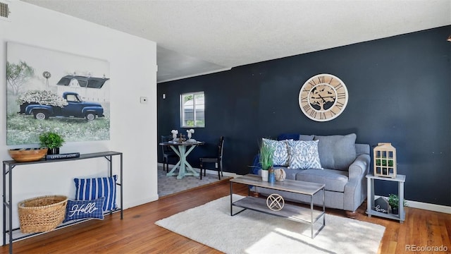 1930 S Prospect Ave, Colorado Springs, CO 80905 - living area featuring wood finished floors and baseboards