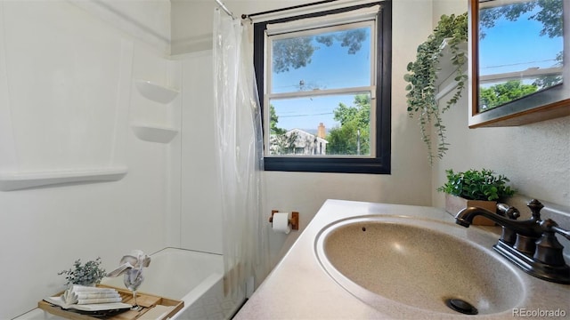 1930 S Prospect Ave, Colorado Springs, CO 80905 - full bathroom with a sink and shower / bath combo with shower curtain