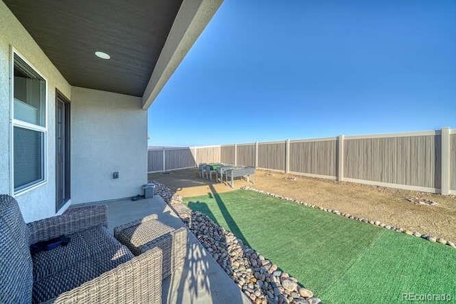 view of yard with a patio area