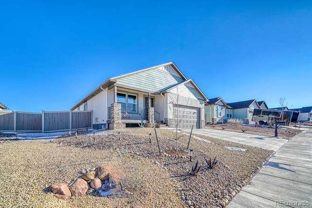 view of front of property featuring a garage