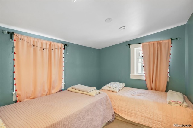 bedroom with vaulted ceiling