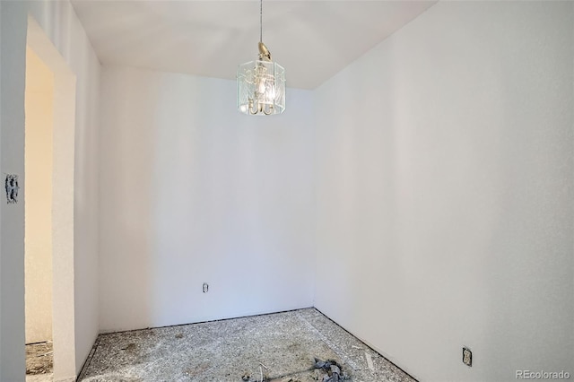 3643 S Sheridan Blvd Unit 12, Denver, CO 80235 - spare room with a chandelier