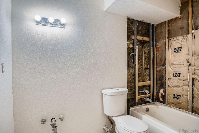 3643 S Sheridan Blvd Unit 12, Denver, CO 80235 - bathroom with shower / washtub combination and a textured wall