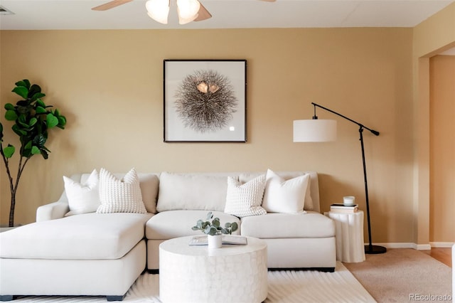 654 S Xenon Ct, Lakewood, CO 80228 - living room with ceiling fan and light colored carpet