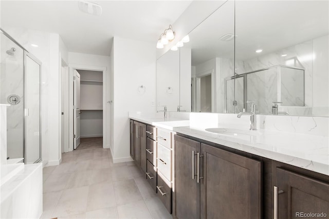 bathroom with vanity and walk in shower