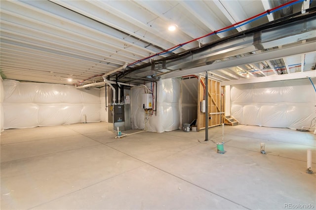 basement with heating unit and water heater