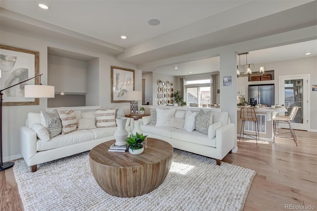 1193 Highview Dr, Erie, CO 80516 - living room with light wood-style floors, recessed lighting, baseboards, and a chandelier