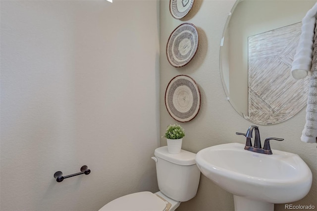 1193 Highview Dr, Erie, CO 80516 - half bath featuring toilet and a sink