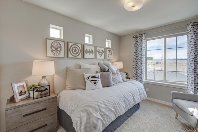 1193 Highview Dr, Erie, CO 80516 - bedroom featuring multiple windows, carpet floors, and baseboards