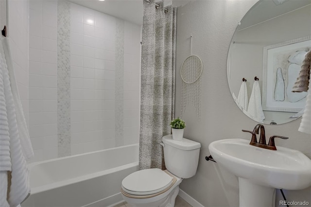1193 Highview Dr, Erie, CO 80516 - bathroom with toilet, shower / bath combo with shower curtain, and baseboards