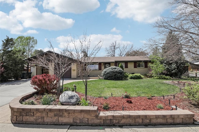 1164 W 101st Pl, Northglenn, CO 80260 - single story home with concrete driveway, a garage, a front lawn, and brick siding