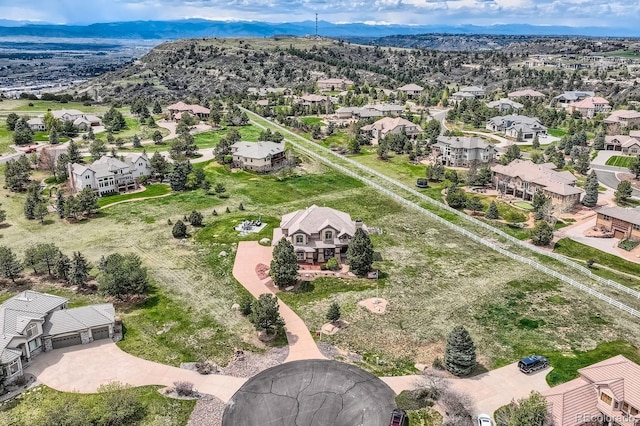 aerial view of residential area with a mountainous background