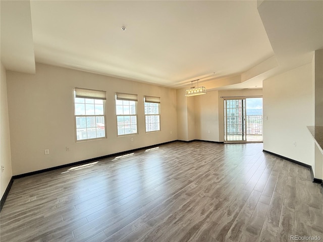 925 N Lincoln St Unit 8H, Denver, CO 80203 - empty room featuring wood finished floors