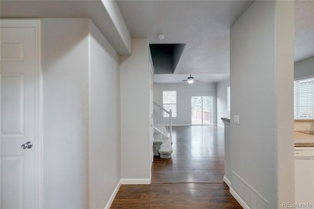 3355 Willowrun Dr, Castle Rock, CO 80109 - hall with dark wood-style floors and stairs