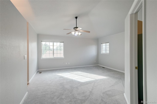 3355 Willowrun Dr, Castle Rock, CO 80109 - spare room featuring carpet flooring, a ceiling fan, and vaulted ceiling