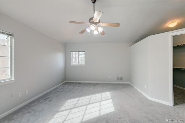 3355 Willowrun Dr, Castle Rock, CO 80109 - unfurnished bedroom featuring carpet flooring, a spacious closet, ceiling fan, and a closet