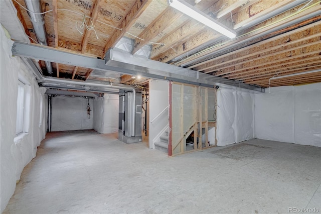 3355 Willowrun Dr, Castle Rock, CO 80109 - below grade area featuring heating unit and stairway