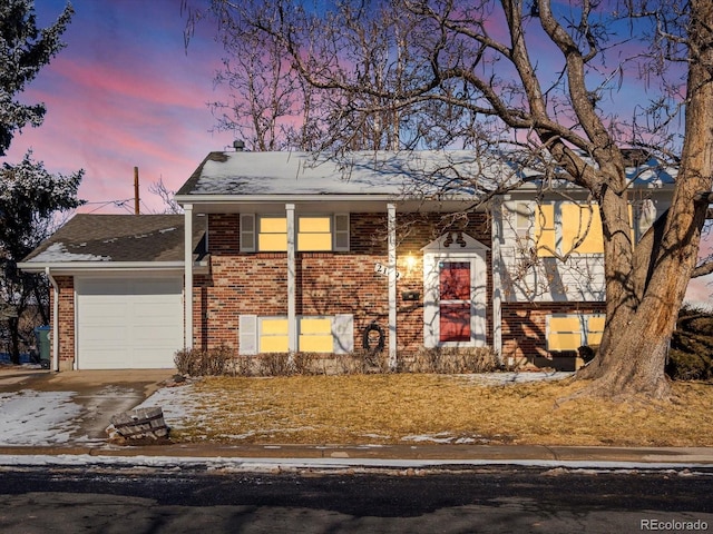 view of front of property with a garage