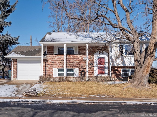 split foyer home featuring a garage